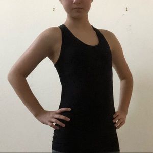Black workout top with built in padded bra